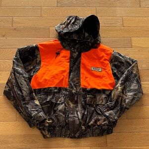 Scent Blocker Plus Frontier camo jacket with reversible camo/orange vest